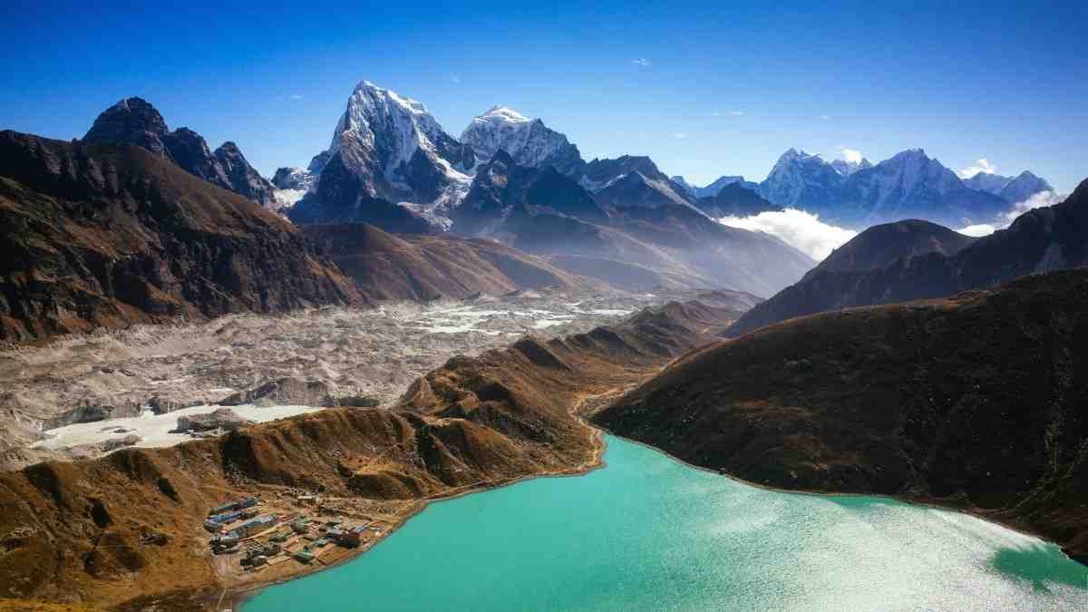 Walk Along Turquoise Waters and Snow-Capped Mountains