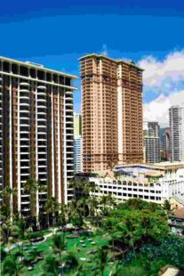 tall brown skyscrapers green palms before them 50kb